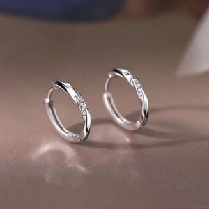 NWT Elegant Silver Twist Hoop Earrings with Sparkling Accents